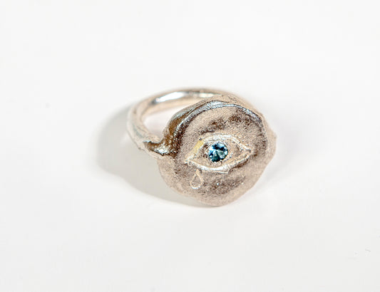 ring with blue aquamarine set in eye 